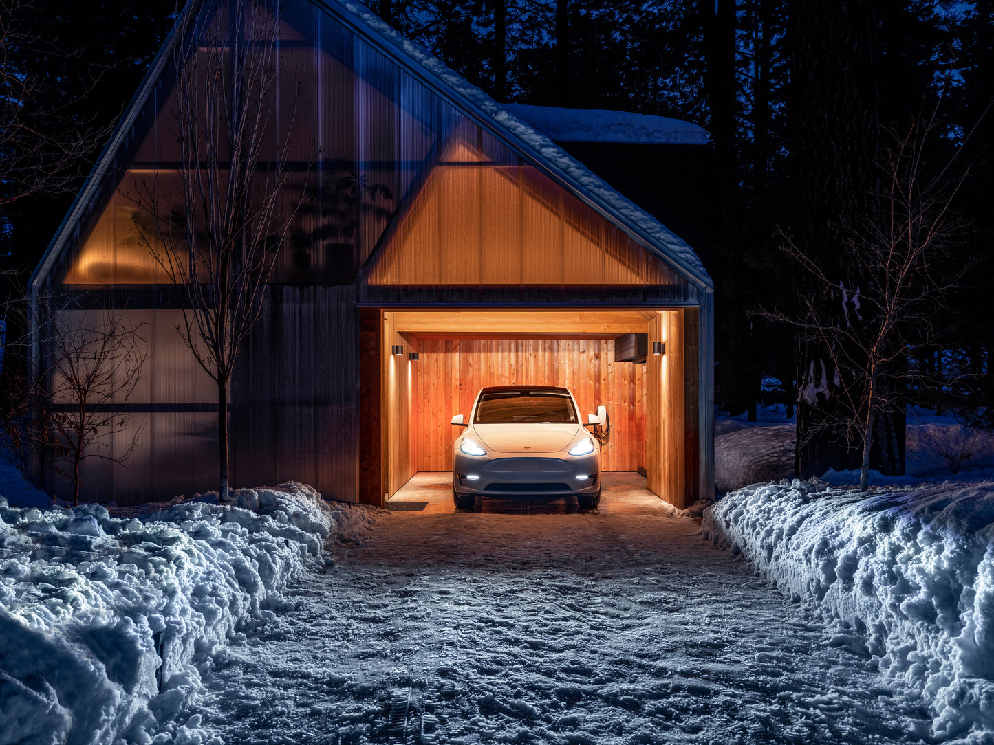 Tesla Wall Connector Generation 3 Tethered EV Chargepoint 1529455-02-E - distant shot of car charging in garage